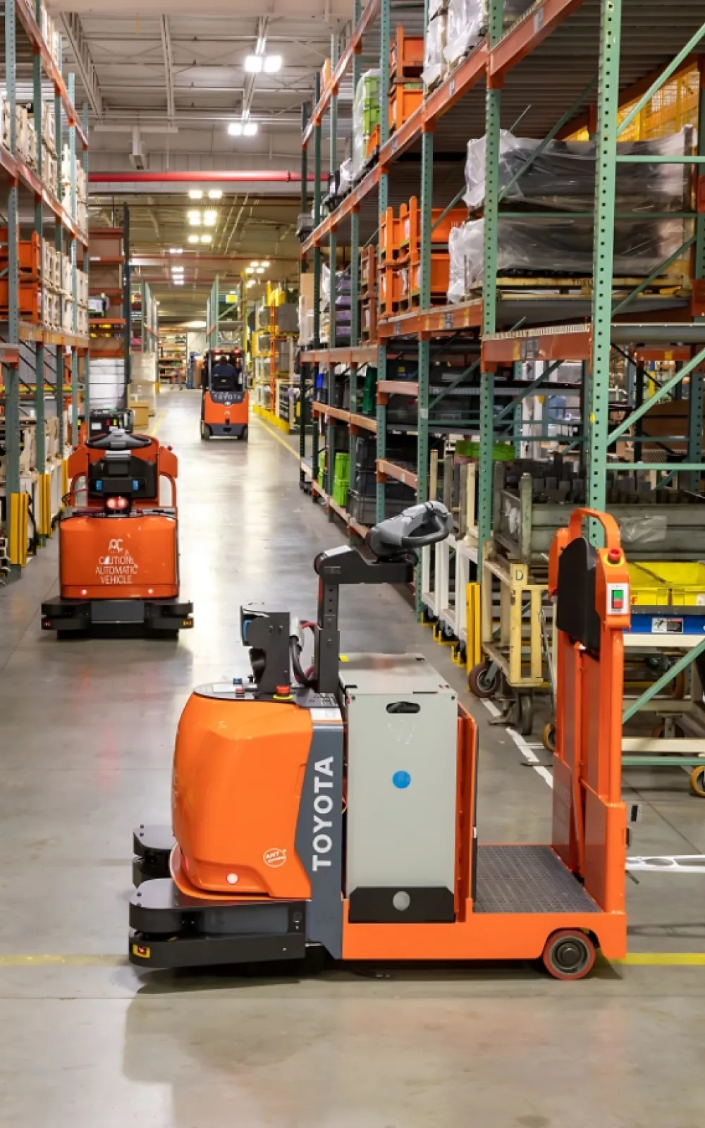Toyota automated guides vehicles in a warehouse.