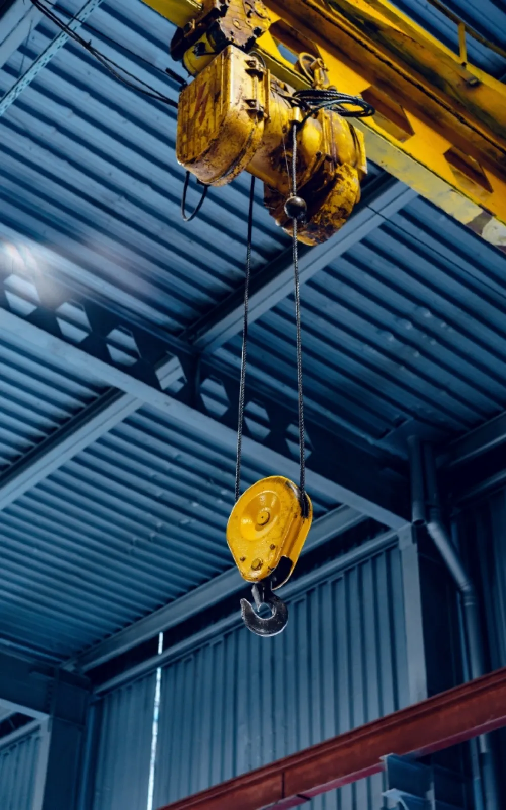 Crane and hoist hook in warehouse
