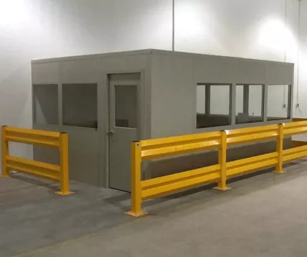 First floor industrial modular office surrounded by protective columns.