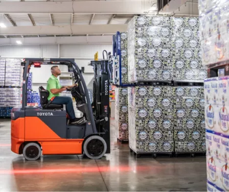 Food and beverage industry using a Toyota forklift to move product.