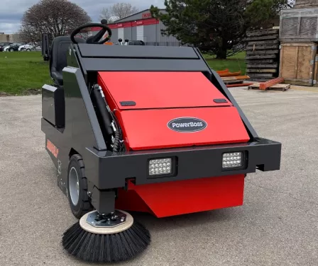 PowerBoss industrial floor sweeper rental in outdoor application.