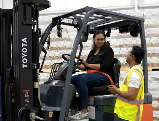 Forklift operator training on a Toyota forklift in a beverge industry.