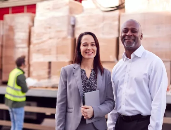 ProLift Toyota major account sales consultants standing in front of customer delivery truck.
