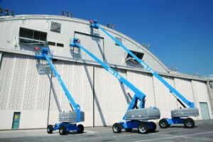 Three different Genie aerial lifts that are side-by-side
